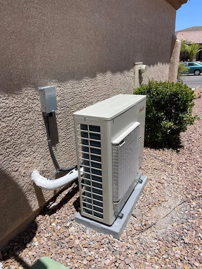 Residential air conditioning condenser unit in Bellevue